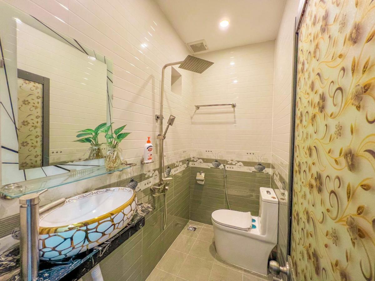 Homestay Qhome Chi Khu Co Ong Esterno foto