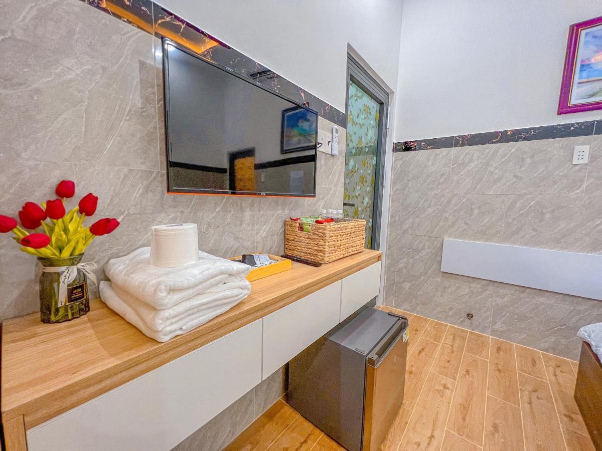 Homestay Qhome Chi Khu Co Ong Esterno foto